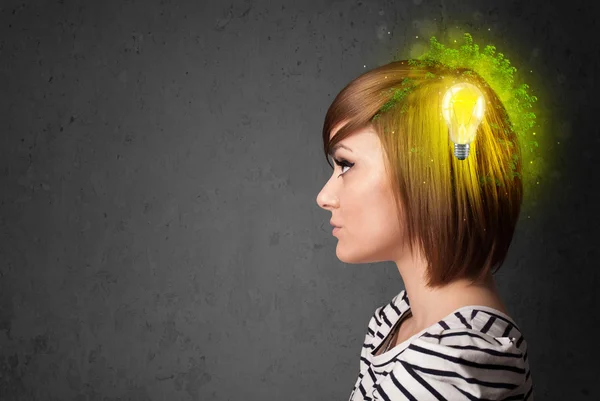 Young mind thinking of green eco energy with lightbulb — Stock Photo, Image