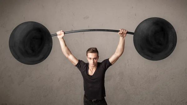 重りを持ち上げる筋肉の男 — ストック写真