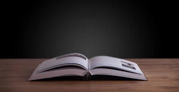 Open book on wooden deck — Stock Photo, Image