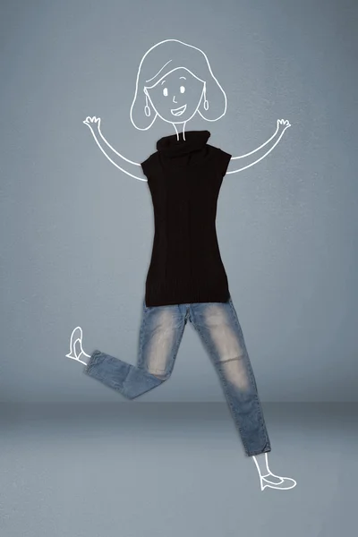 Umieszczone ubrania w akcji z kobieta rysunek — Zdjęcie stockowe