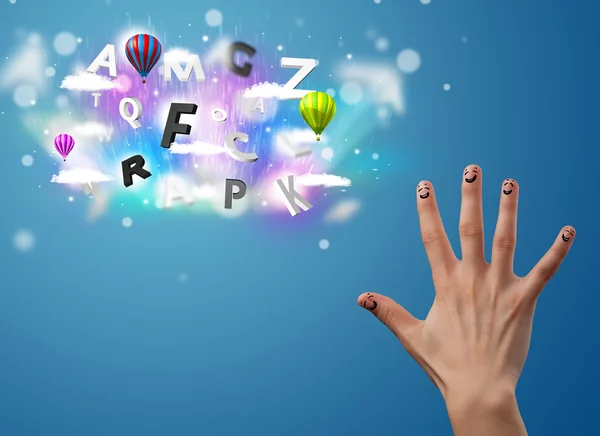 Happy smiley fingers looking at colorful magical clouds and ball — Stock Photo, Image