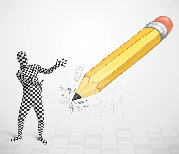 Guy in body mask with a big hand drawn pencil — Stock Photo, Image