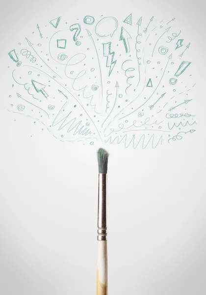 Brush close-up with sketchy arrows — Stock Photo, Image