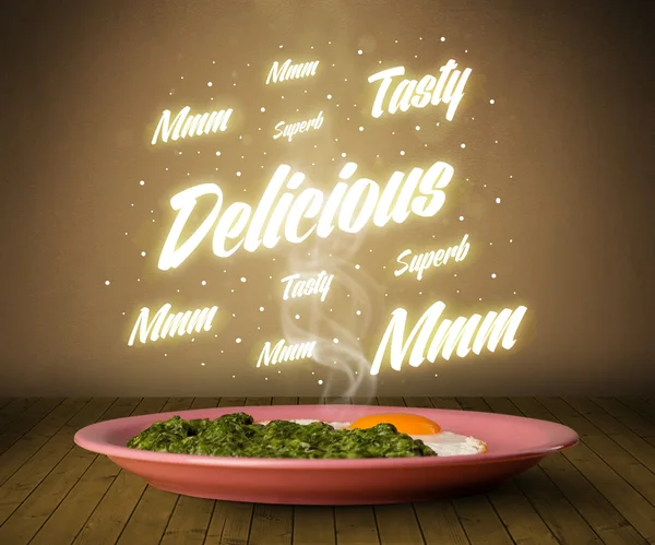 Пищевая тарелка с вкусными и светящимися надписями — стоковое фото