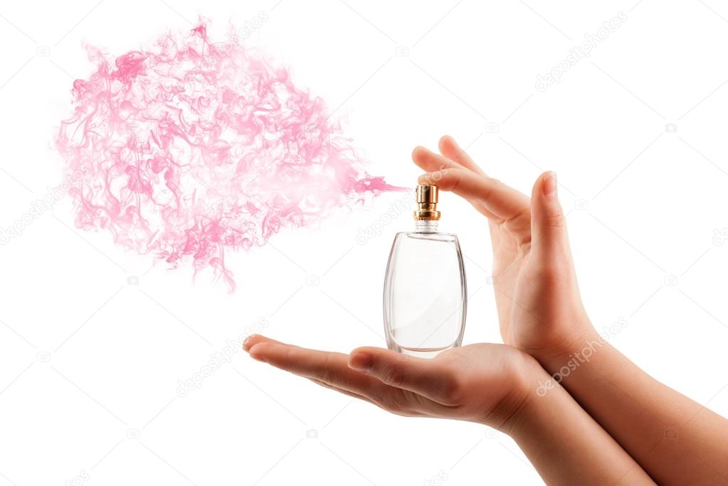 Woman hands spraying perfume — Stock Photo © ra2studio #42034647