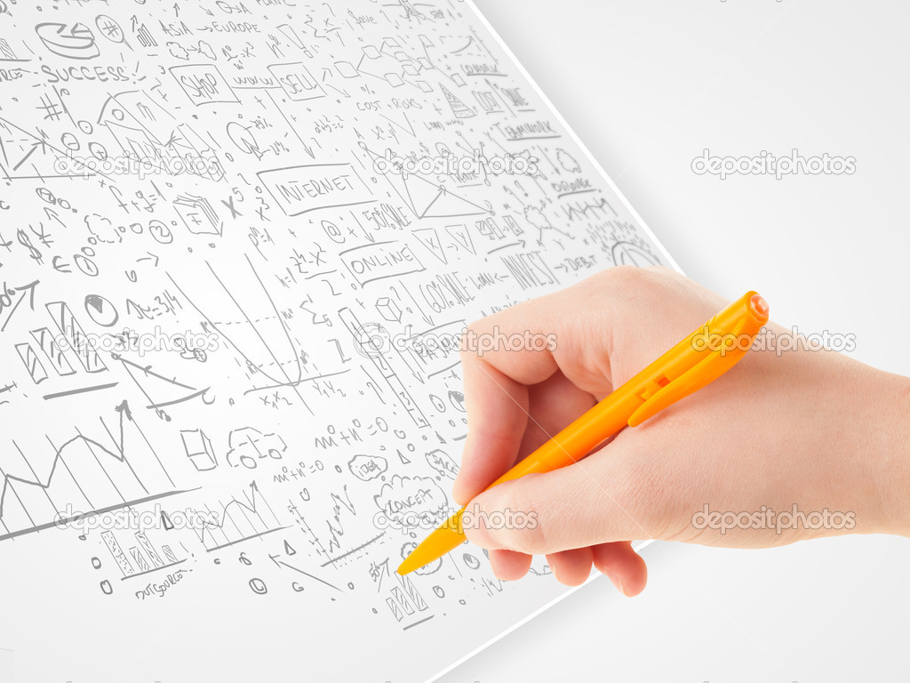 Human hand sketching ideas on a white paper