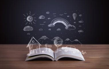Elle çizilmiş peyzaj ile açık kitap 