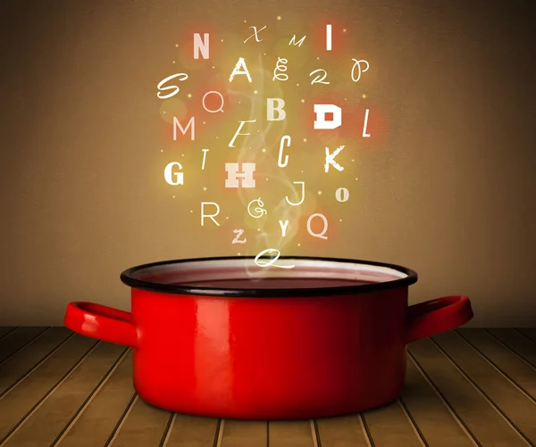 从烹饪锅出来的发光字母 — 图库照片
