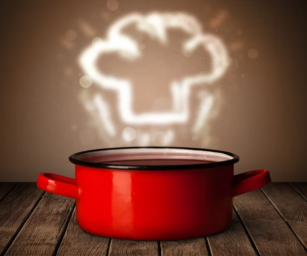 Chef hat above cooking pot — Stock Photo, Image