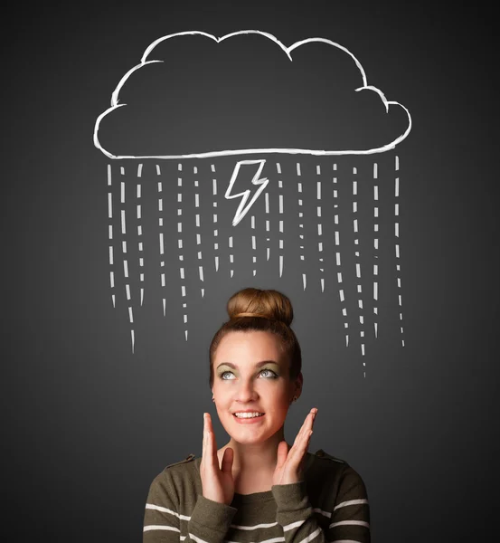 Jonge vrouw met onweerswolk boven haar hoofd — Stockfoto