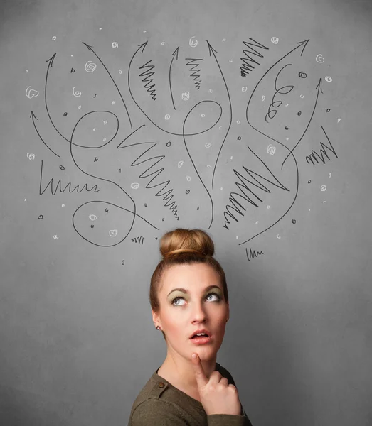 Young woman thinking with arrows over her head — Stock Photo, Image