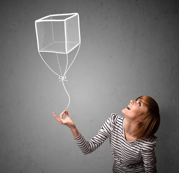 Kvinna med en kub ballong — Stockfoto