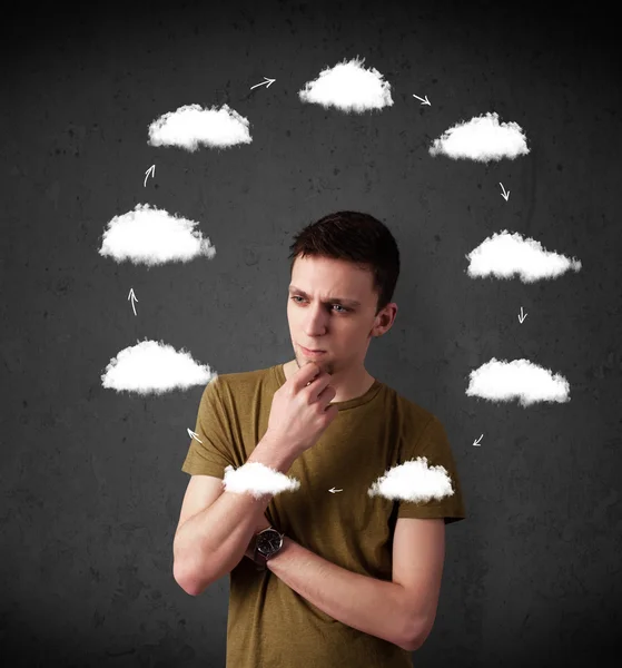 Young man thinking with cloud circulation around his head — Stock Photo, Image