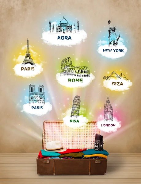 Tourist suitcase with famous landmarks around the world — Stock Photo, Image