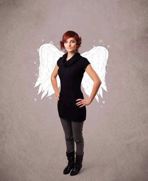 Person with angel illustrated wings on grungy background — Stock Photo, Image