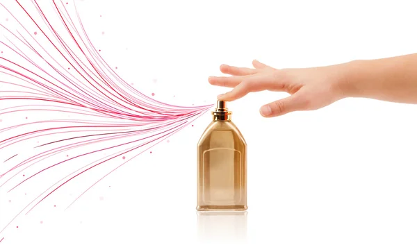 Woman hands spraying colorful lines — Stock Photo, Image