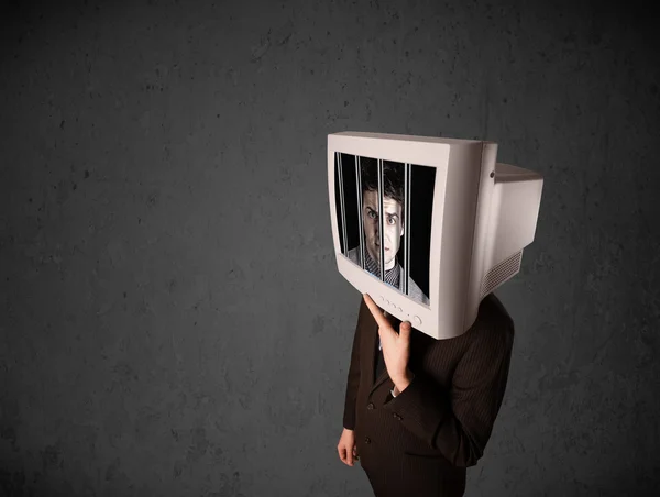 Business man with monitor on his head traped into a digital syst — Stock Photo, Image