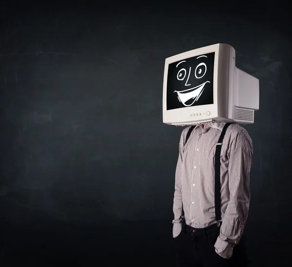 Hombre de negocios feliz con una cabeza de monitor de PC y una cara sonriente — Foto de Stock