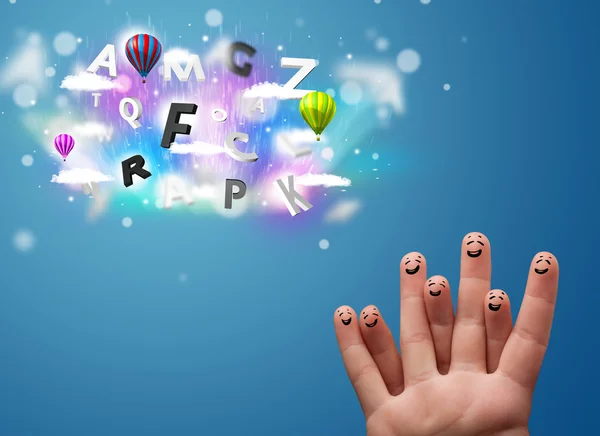 Happy smiley fingers looking at colorful magical clouds and ball — Stock Photo, Image