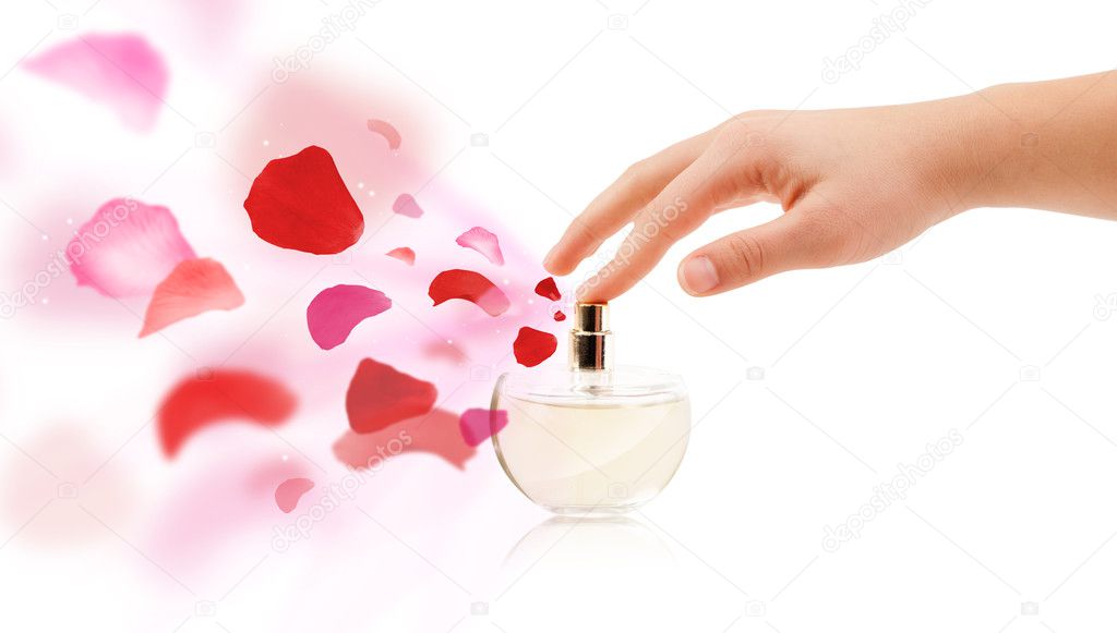 woman hands spraying rose petals