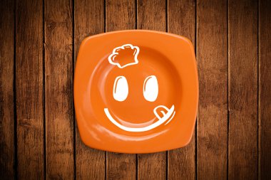 Renkli tabak üzerinde mutlu bir çizgi film yüzü