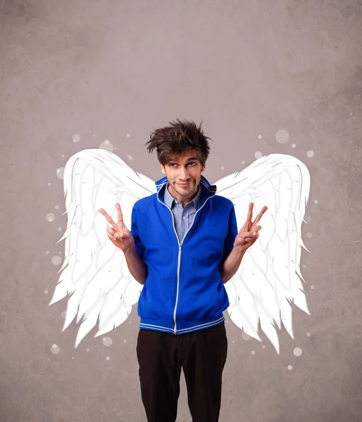 Persoon met engel geïllustreerd vleugels op grungy achtergrond — Stockfoto