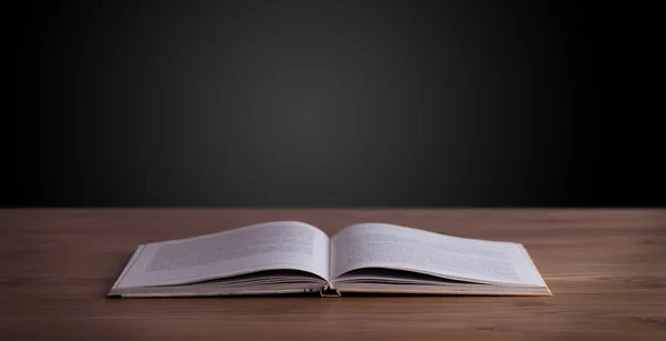 Open book on wooden deck — Stock Photo, Image