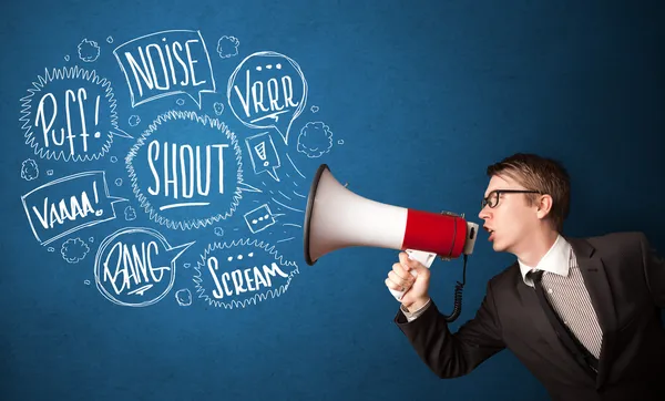 Guy in suit yelling into megaphone and hand drawn speech bubbles — Stock Photo, Image