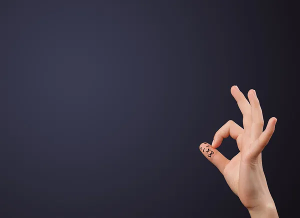 Happy smiley fingers looking at empty wall copyspace — Stock Photo, Image