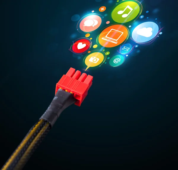 Social media icons coming out of electric cable — Stock Photo, Image