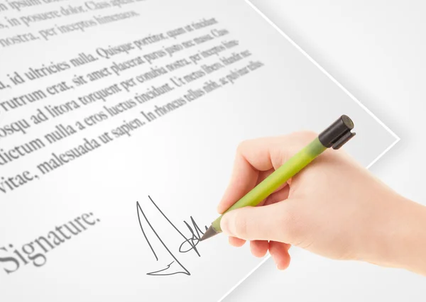 Hand writing personal signature on a paper form — Stock Photo, Image