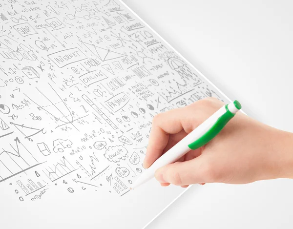 Human hand sketching ideas on a white paper — Stock Photo, Image