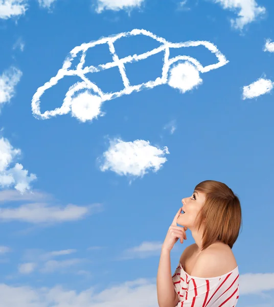 Junges Mädchen blickt auf Autowolke am blauen Himmel — Stockfoto