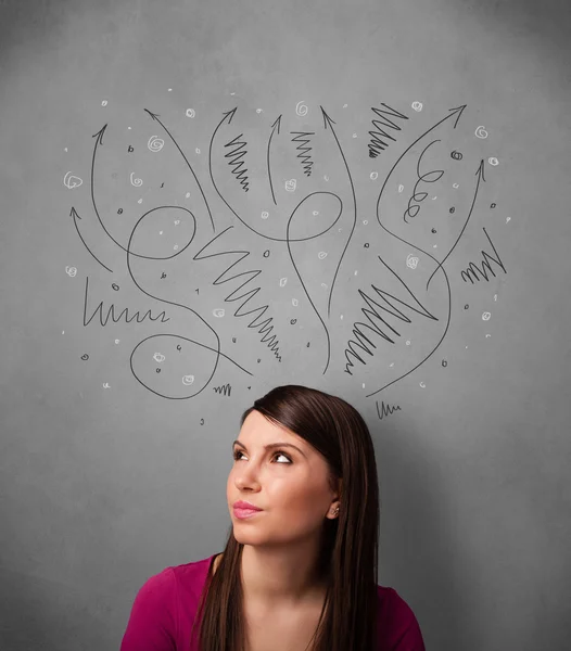 Young woman thinking with arrows over her head — Stock Photo, Image