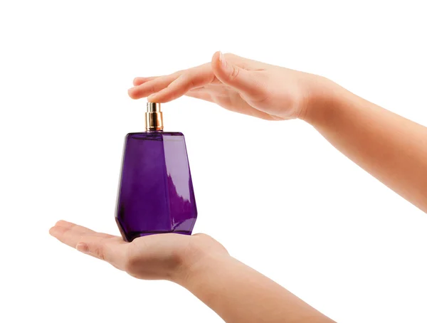 Mujer manos rociando perfume — Foto de Stock