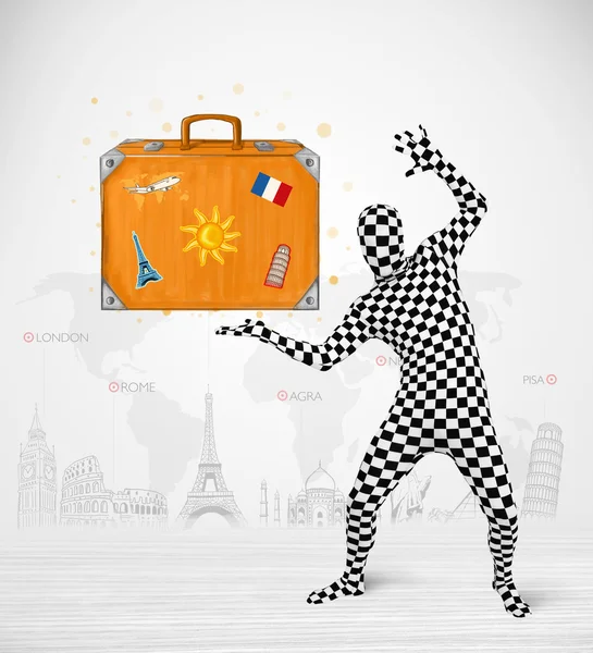 Man in full body suit presenting vacation suitcase — Stock Photo, Image