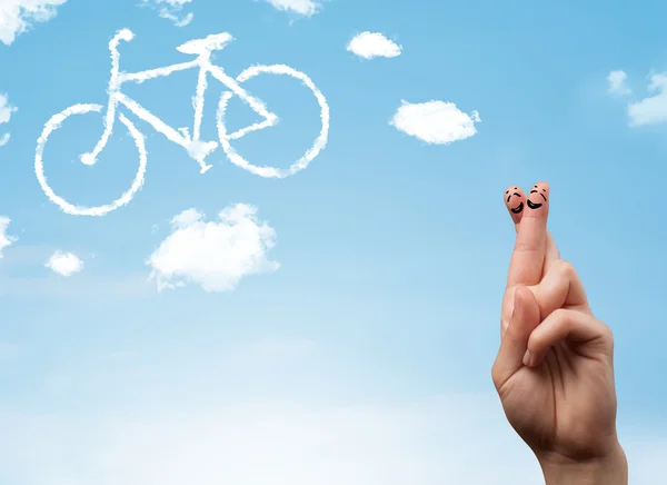 Happy smiley fingers looking at a bicycle shapeed cloud — Stock Photo, Image