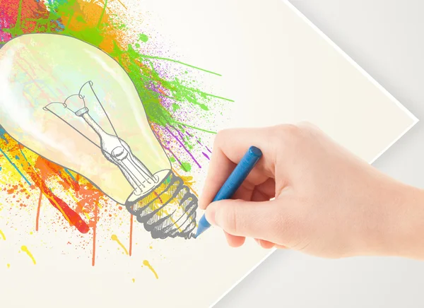 Hand drawing on paper a colorful splatter lightbulb — Stock Photo, Image