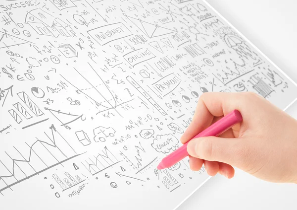 Human hand sketching ideas on a white paper — Stock Photo, Image