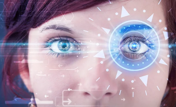 Cyber girl with technolgy eye looking into blue iris — Stock Photo, Image