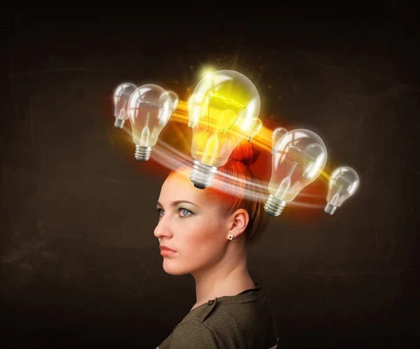 Woman with light bulbs circleing around her head — Stock Photo, Image