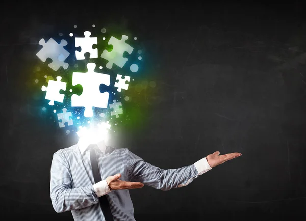 Character in suit with puzzle head concept — Stock Photo, Image