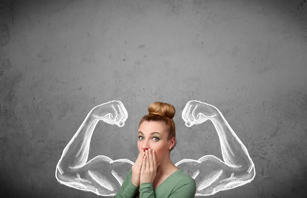 Young woman with strong muscled arms — Stock Photo, Image