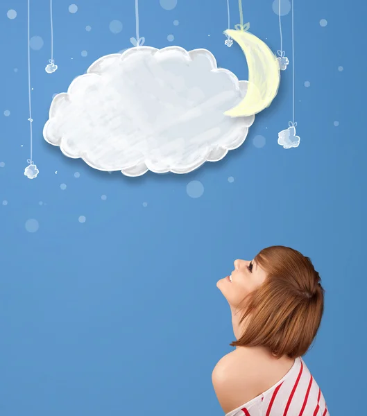 Mladá dívka dívá na kreslené noční mraky s měsícem — Stock fotografie