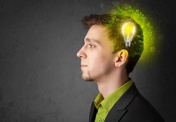 Young mind thinking of green eco energy with lightbulb
