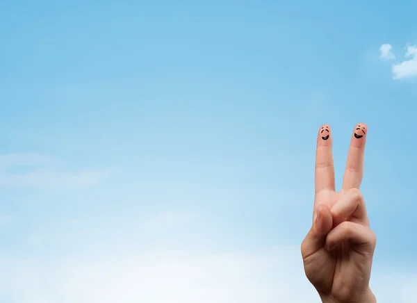 Happy smiley fingers looking at clear blue sky copyspace — Stock Photo, Image