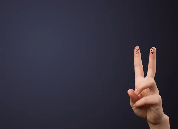 Happy smiley fingers looking at empty wall copyspace — Stock Photo, Image