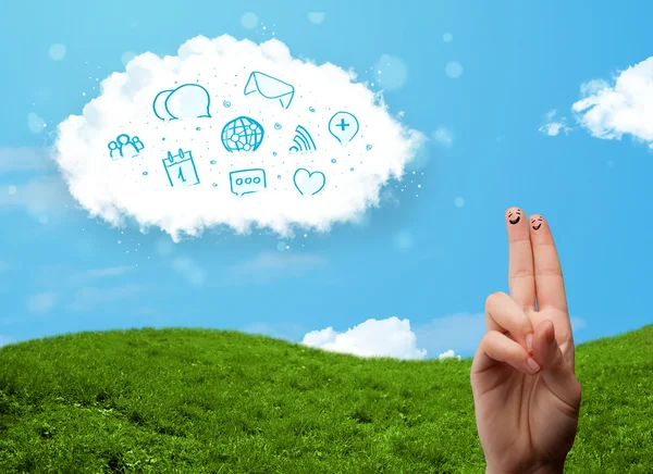 Happy smiley fingers looking at cloud with blue social icons and — Stock Photo, Image