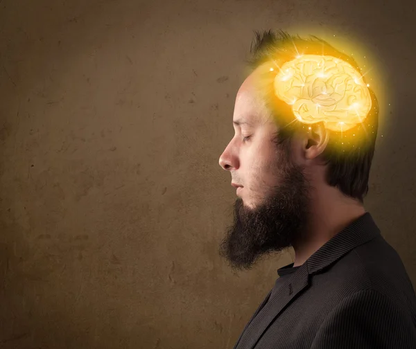 Man thinking with glowing brain illustration — Stock Photo, Image