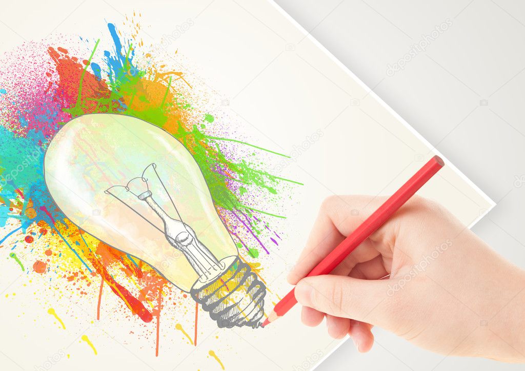 Hand drawing on paper a colorful splatter lightbulb 